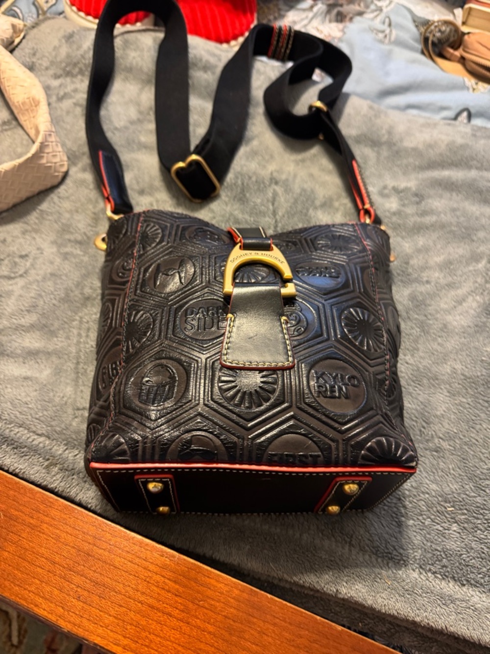 Dooney & Bourke Black Leather Crossbody with Red Trim and Gold Hardware
